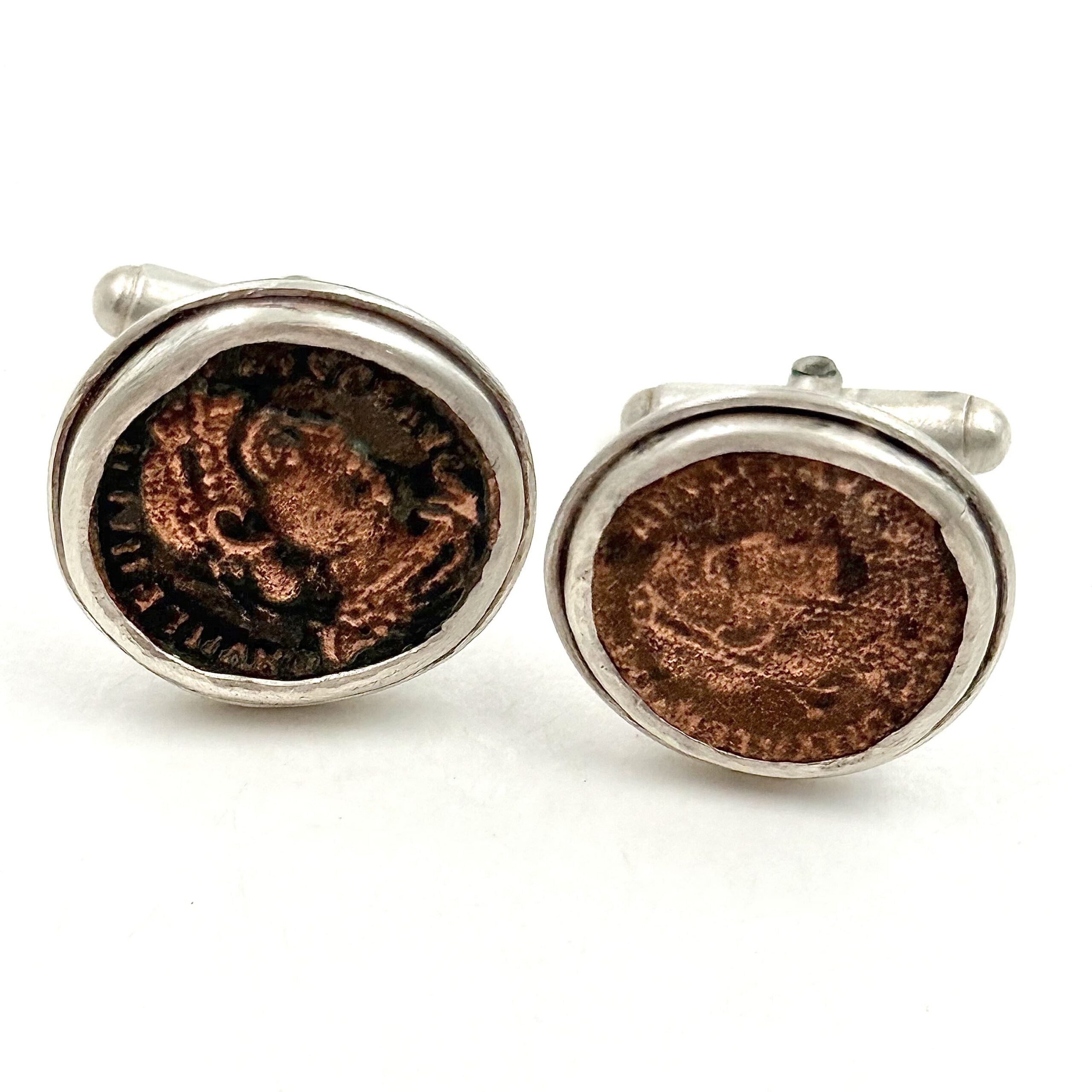 Silver cufflinks with two Roman coins
